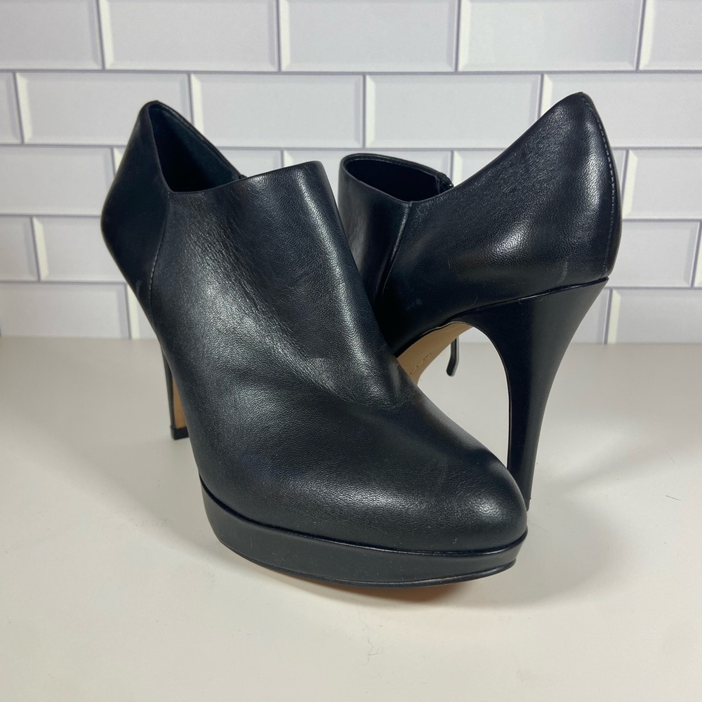 Black leather ankle boots with 4 inch heel